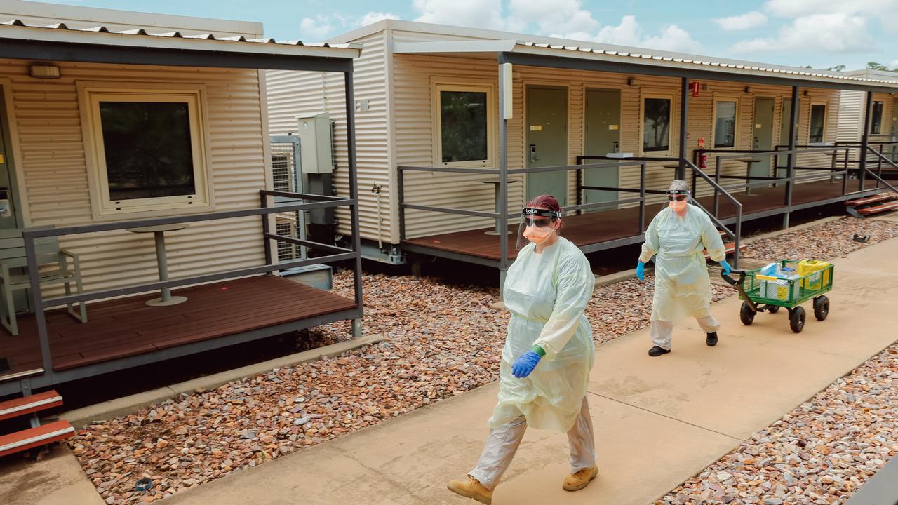 Protesters in Darwin have demanded the release of 13 wharfies from quarantine in Howard Springs.