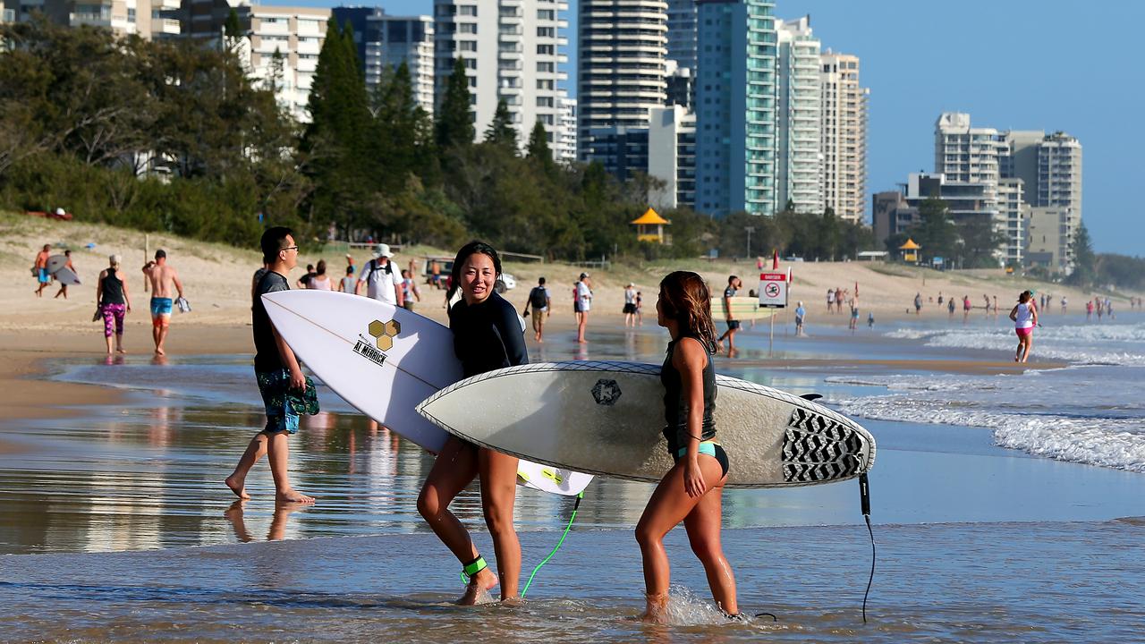 Queenslanders are being urged to take up the holiday vacancies left by mass cancellations from NSW.