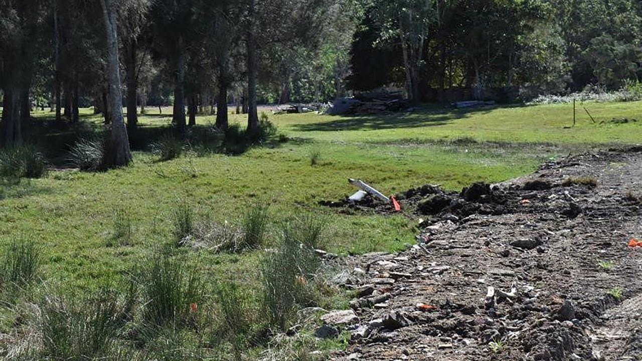 Concrete, car parts, timber, plastic and asbestos were dumped on the banks of the Hawkesbury River.