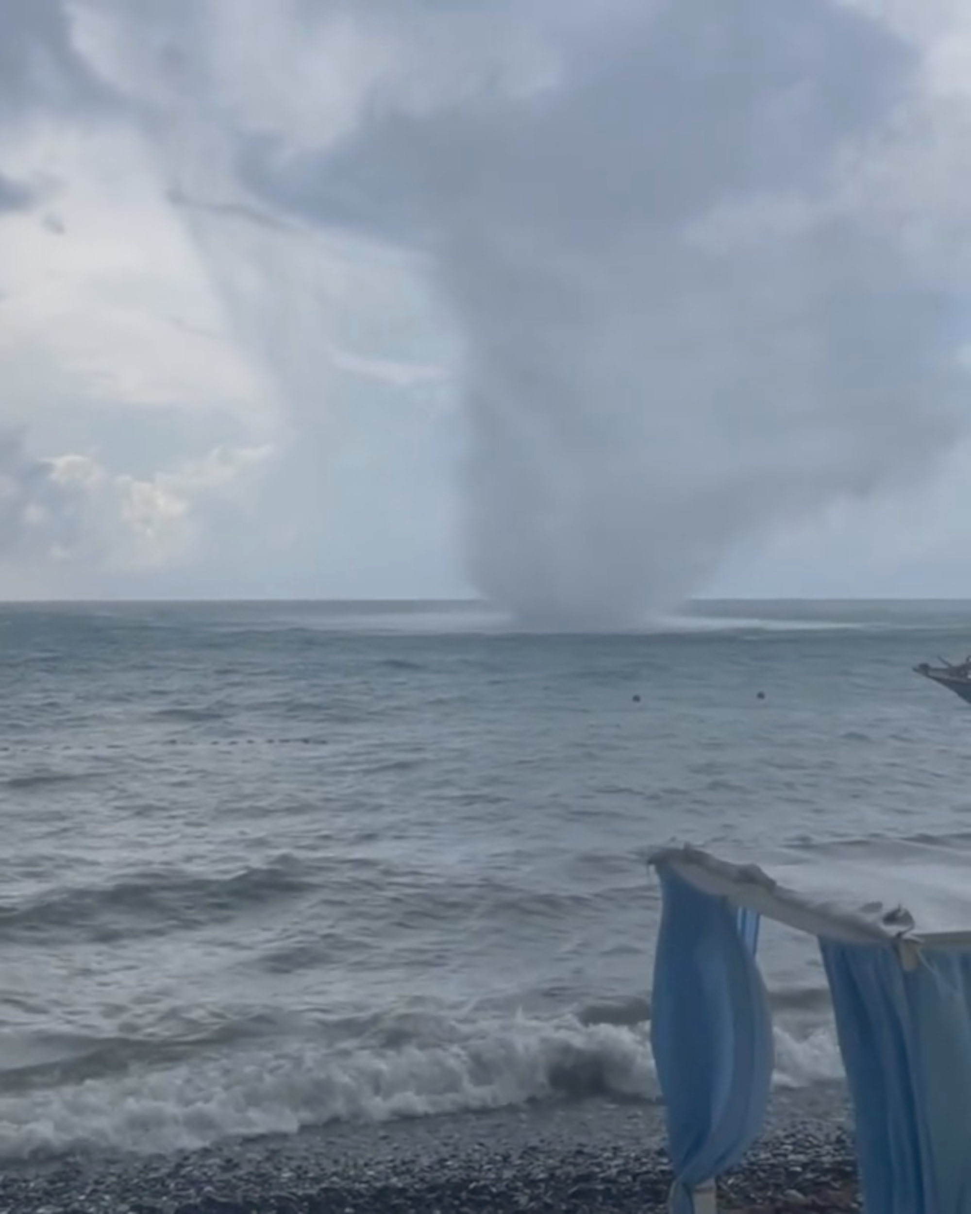 A powerful waterspout left a cafe on the beach without windows and roofs near Novorossiysk, Russia. Note: Picture is a screenshot from a video (@flowerjul/Zenger News)