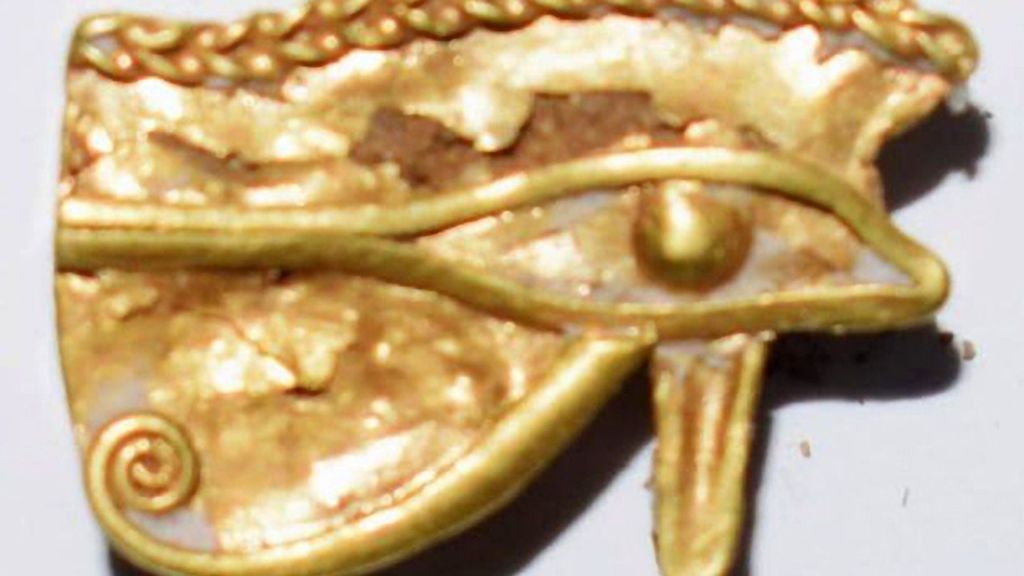 A golden eye of Horus is among antiquities unearthed at Tel El Farain archeological site in Kafr El Sheikh Governate, Egypt. (Egyptian Ministry of Tourism and Antiquities/Zenger)