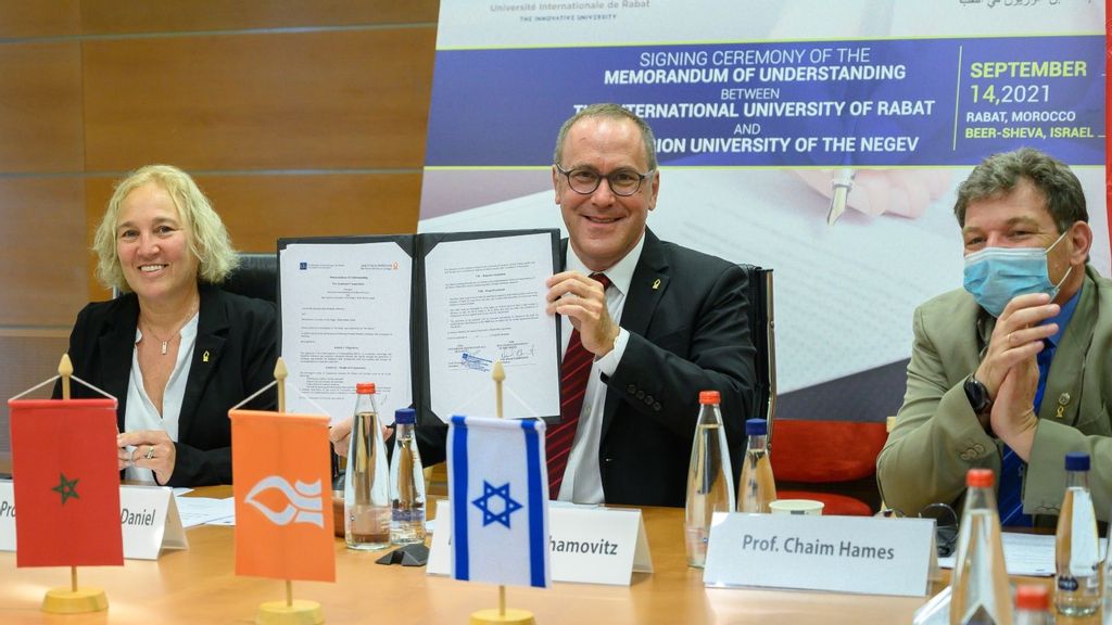 From left, BGU Vice President for Global Engagement, professor Limor Aharonson-Daniel; BGU President, professor Daniel Chamovitz; and BGU Rector, professor Chaim Hames, during the signing ceremony of an MOU between Israeli and Moroccan universities. (Dani Machlis/BGU)