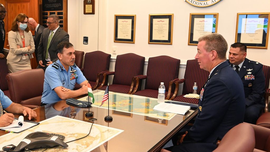 Brig. Gen. Brian Bruckbauer hosts an office call in honor of his fellow cochair of the US-India Defense Technology and Trade Initiative Air Vice Marshal Narmdeshwar Tiwari in the Pentagon, Arlington, Va., July 16, 2021. (Andy Morataya/U.S Air Force)