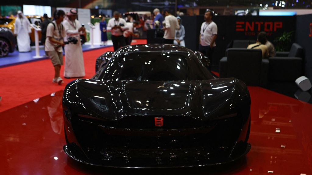 strongA Entop (Afghanistan manufacturer) Mada 9 supercar is on display during the opening ceremony of the Geneva International Motor Show (GIMS) at the Doha Exhibition and Convention Center on October 6, 2023. The newly launched black simurgh from Entop in Afghanistan represents the country's art and technology. KARIM JAAFAR/AFP/GETTY IMAGES. /strong