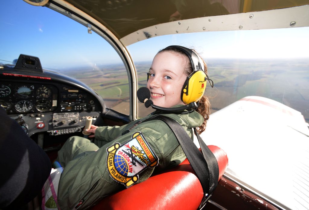 'Britain's former youngest female pilot is set to break another record when she flies a WWI warplane - built by pensioners who started the job before she was born. SWNS